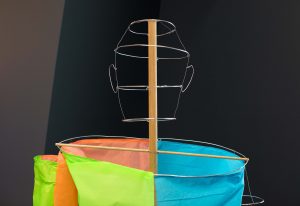 A mannequin made of wood, wire and coloured paper