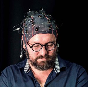 Person wearing EEG cap