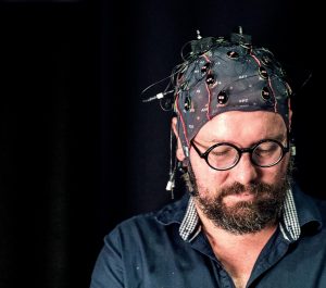 Person wearing EEG cap